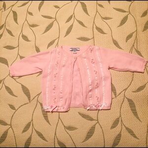 Pink button down sweater from Hartstrings